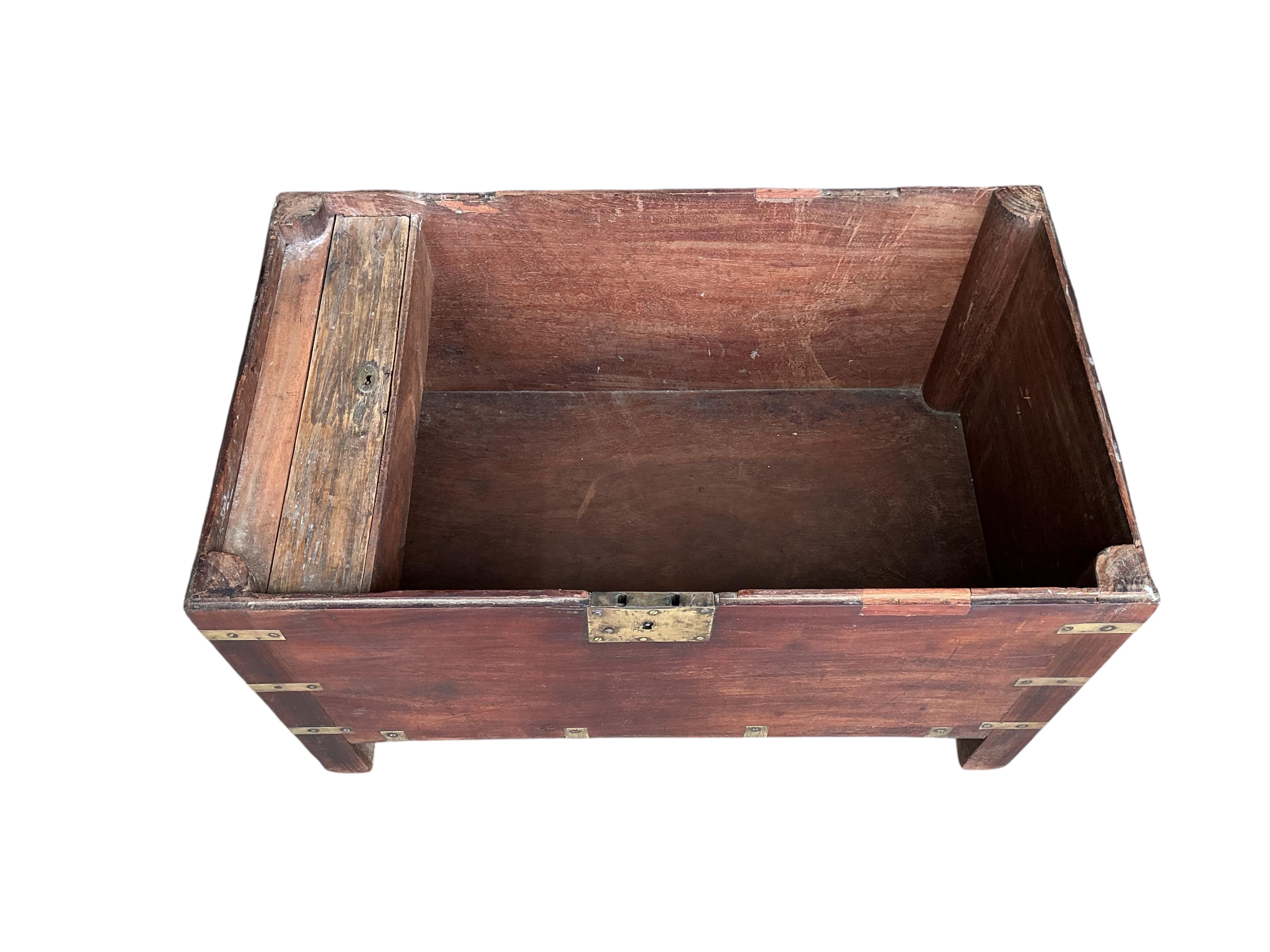 A brass mounted rectangular hardwood trunk, width 72cm, depth 42cm, height 49cm